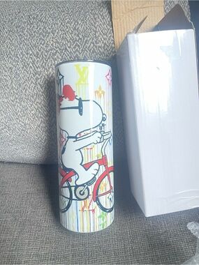 White Snoopy Bicycle Skinny Tumbler with Colorful Graphic